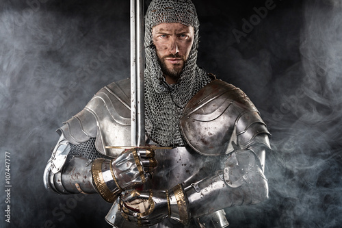 Photographie Medieval Warrior with Chain Mail Armour and Sword