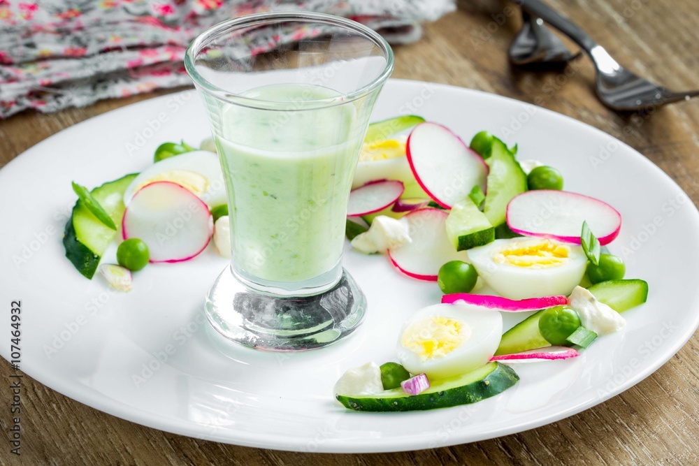 Healthy fresh spring salad with radish, cucumber, eggs, peas Healthy fresh spring salad with radish, cucumber, eggs, peas