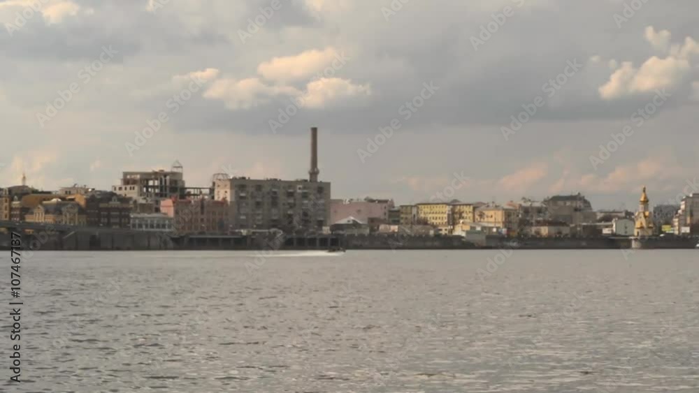 Motor Boat Cruising on the Dnieper River in Kyiv, Ukraine Motor Boat Cruising on the Dnieper River in Kyiv, Ukraine