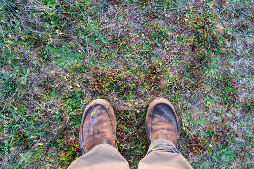 Man's shoes on ground