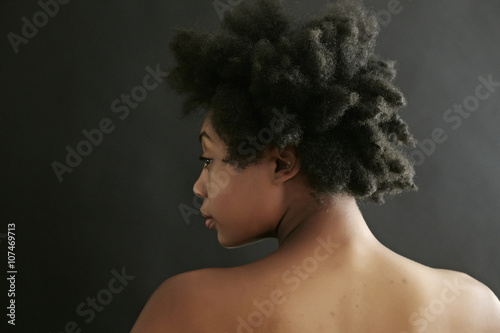 Close up of black woman looking over shoulder