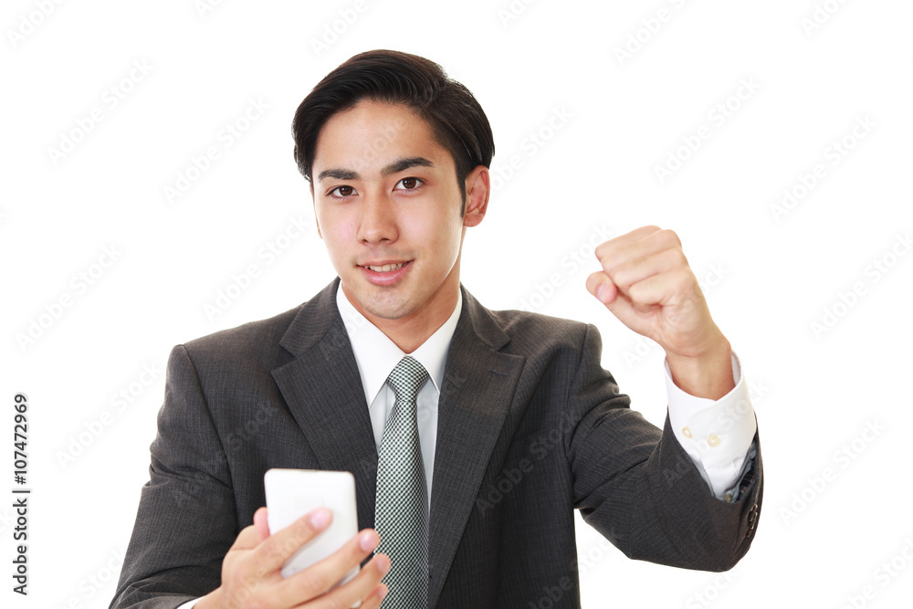 ガッツポーズのビジネスマン ガッツポーズのビジネスマン