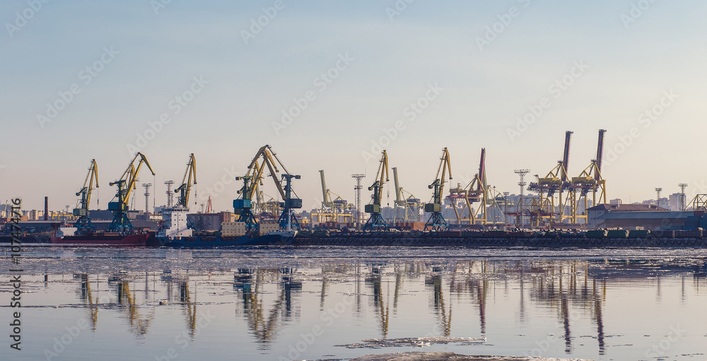 Cargo crane and cargo ships inthe port, Saint-Petersburg, Russia