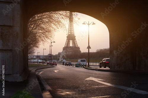 Canvas Print unusual view of Paris, Eiffel Tower framed in bridge