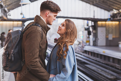 Fotografie, Obraz long distance relationship, couple on platform at the train station, meeting or