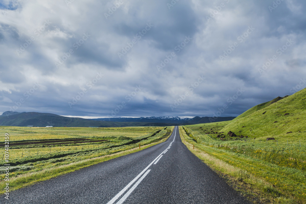 road in dramatic landscape, travel concept, beautiful scenery of Iceland