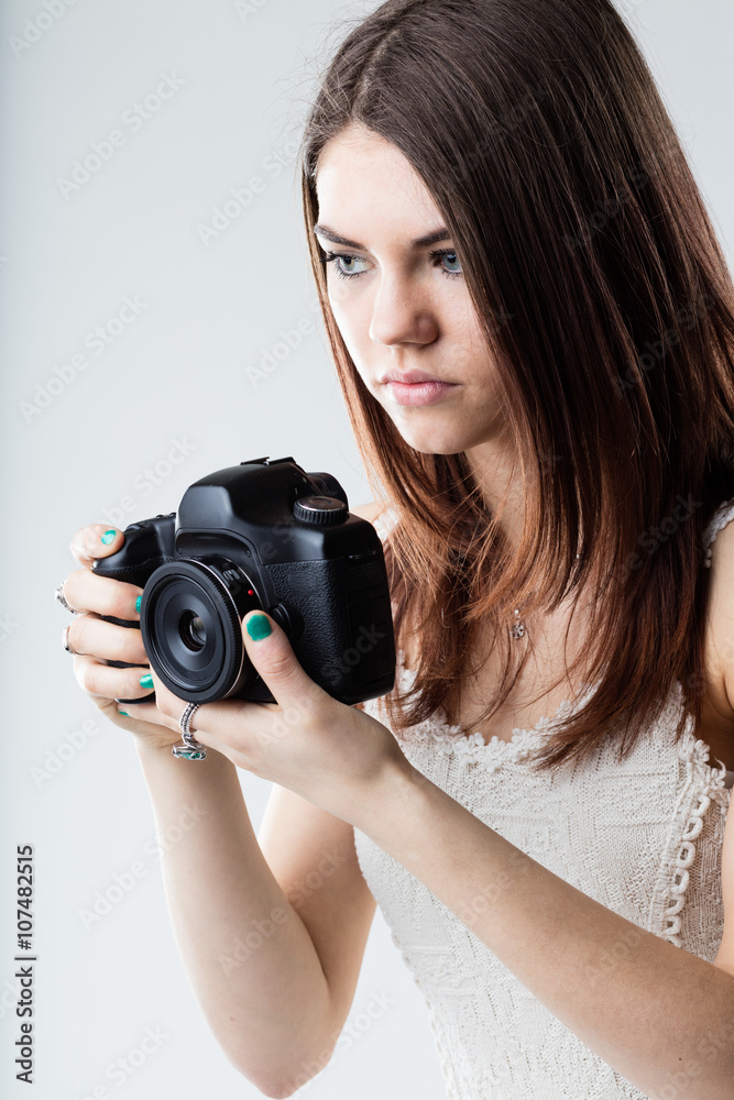 beautiful girl holding a reflex camera beautiful girl holding a reflex camera