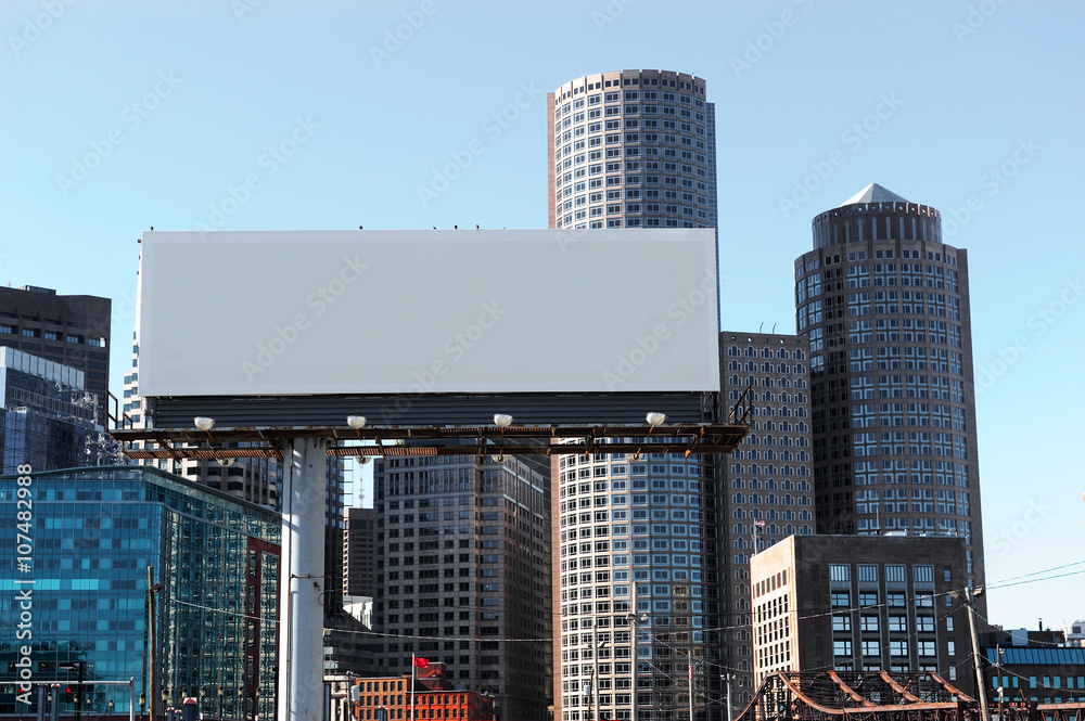 empty advertisement billboard before Boston downtown skyscraper - obrazy, fototapety, plakaty 