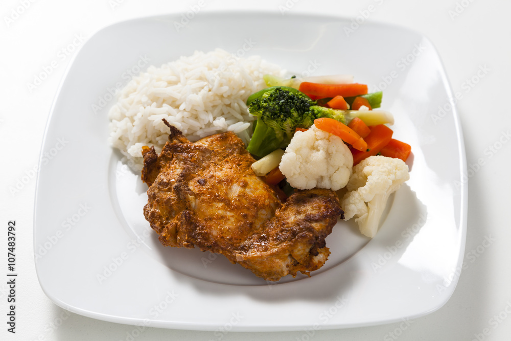 Tandoori chicken with rice and vegetables Tandoori chicken with rice and vegetables