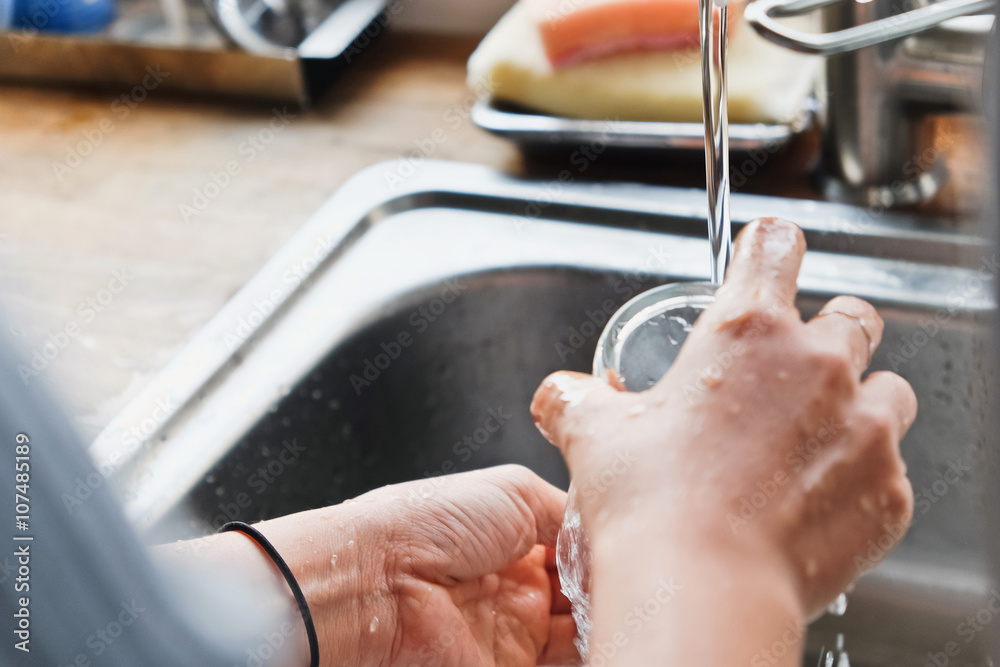 Fototapeta premium House Work,Close up image of washing dishes.