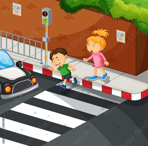 Boy and girl crossing the road