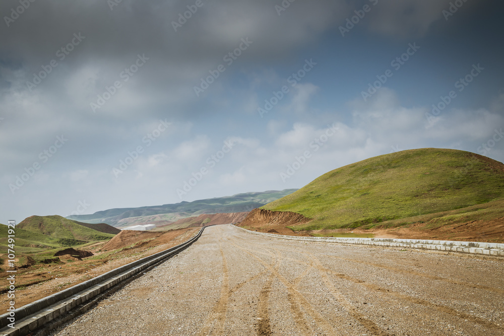 Road in Iraqi desert in Spring season