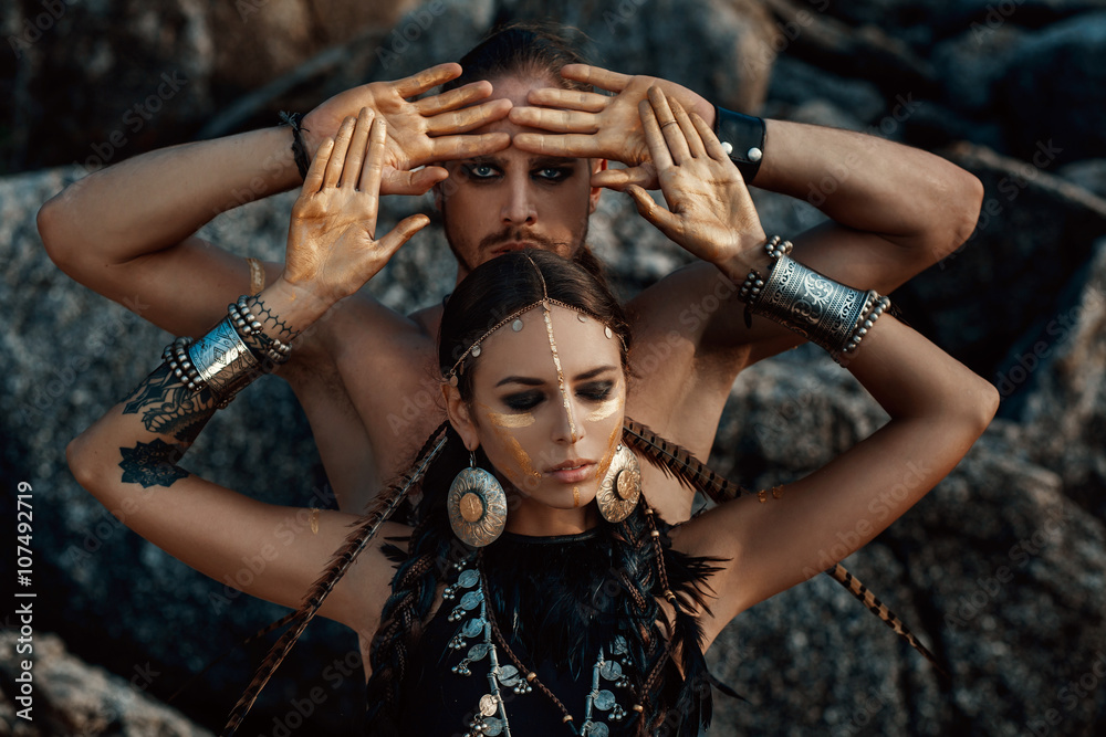 tribal man and woman outdoors