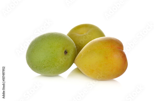 fresh young apricot on white background
