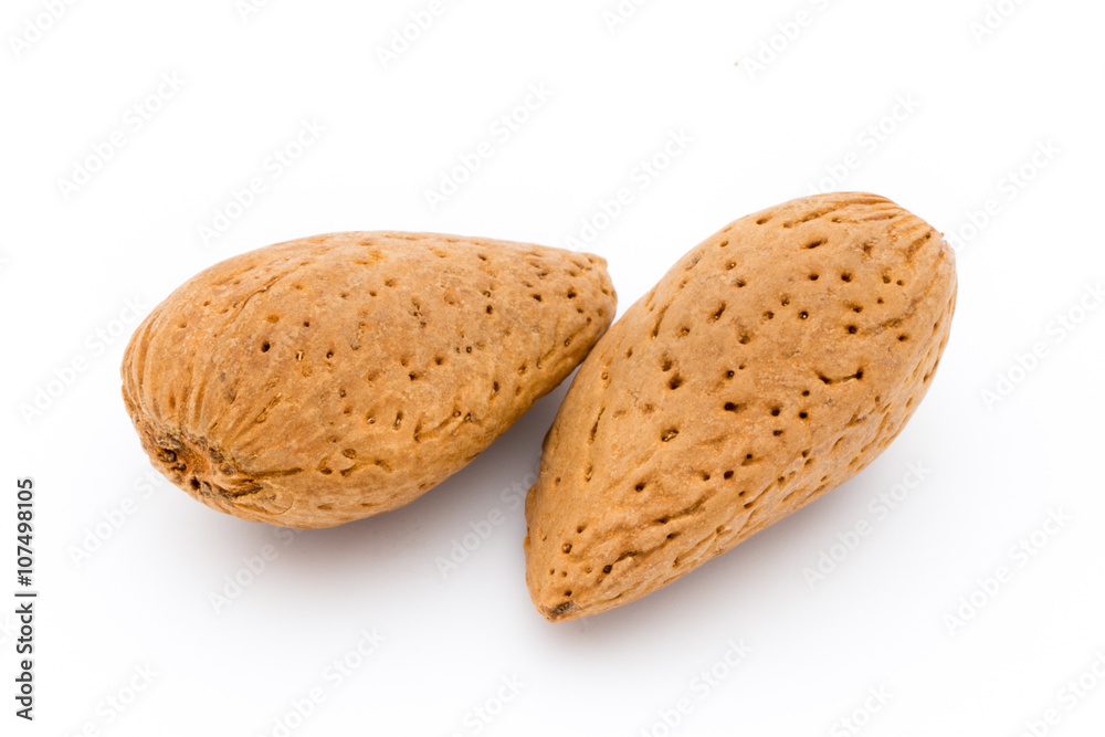 Group of almond nuts. Isolated on a white background. Group of almond nuts. Isolated on a white background.