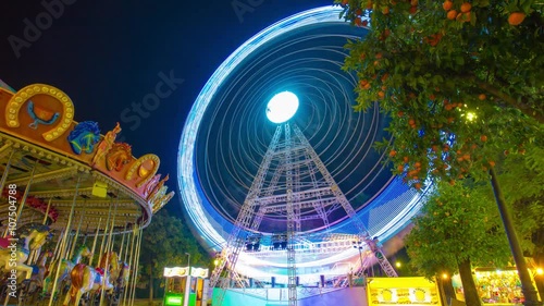 seville nigh light ferris wheel park square 4k time lapse spain
