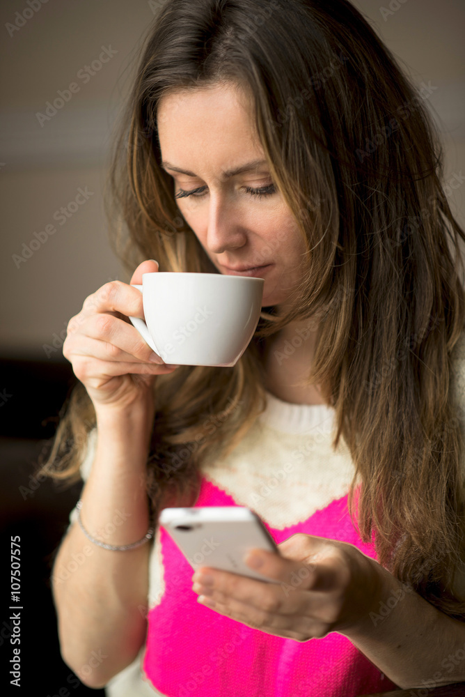 Young girl, sitting in a cafe with cup of coffee Young girl, sitting in a cafe with cup of coffee