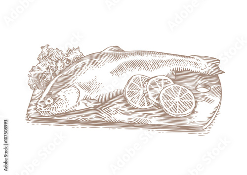 Raw trout with lettuce and lemon on the wooden board