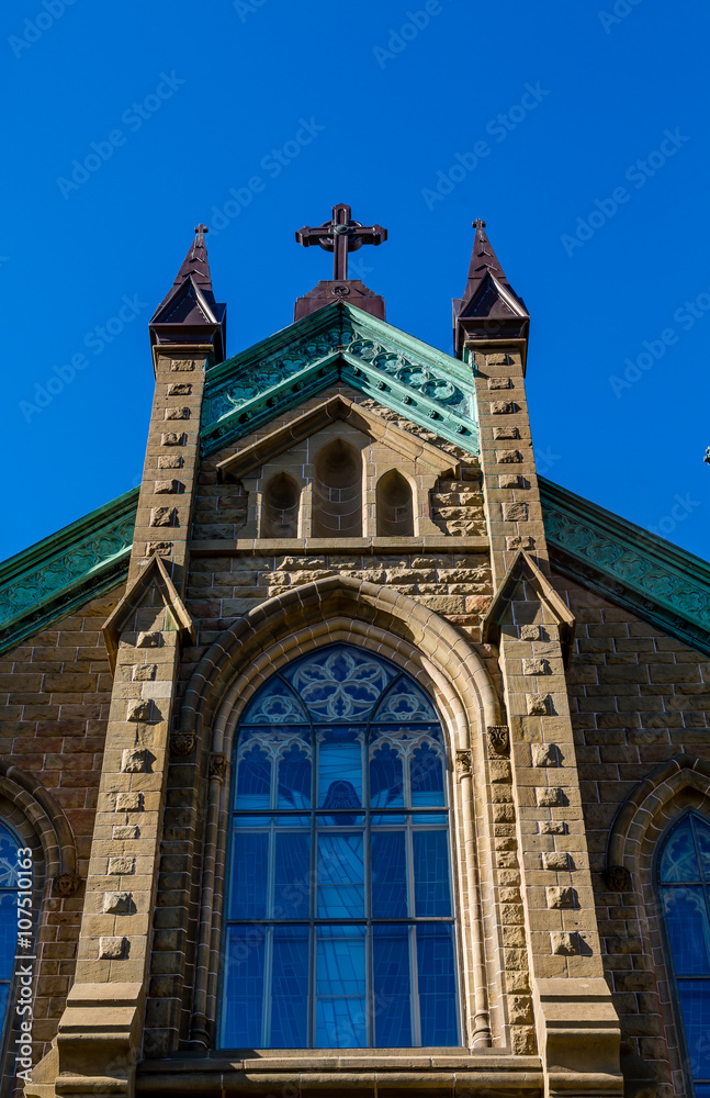 Blue Window at Top of Church