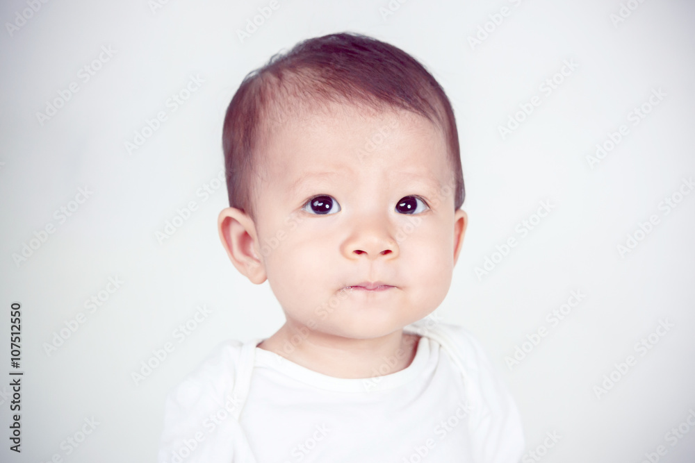Portrait of an adorable baby girl (soft focus on the eyes)