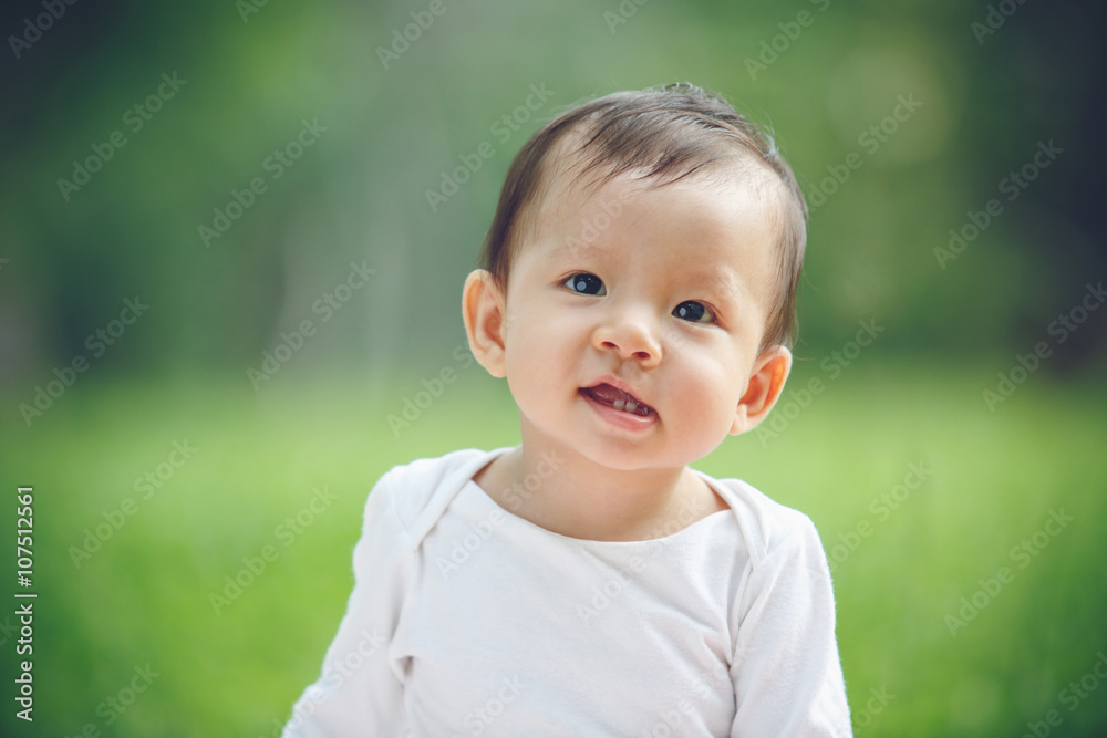Asian child portrait in garden (soft focus on the eyes) Asian child portrait in garden (soft focus on the eyes)