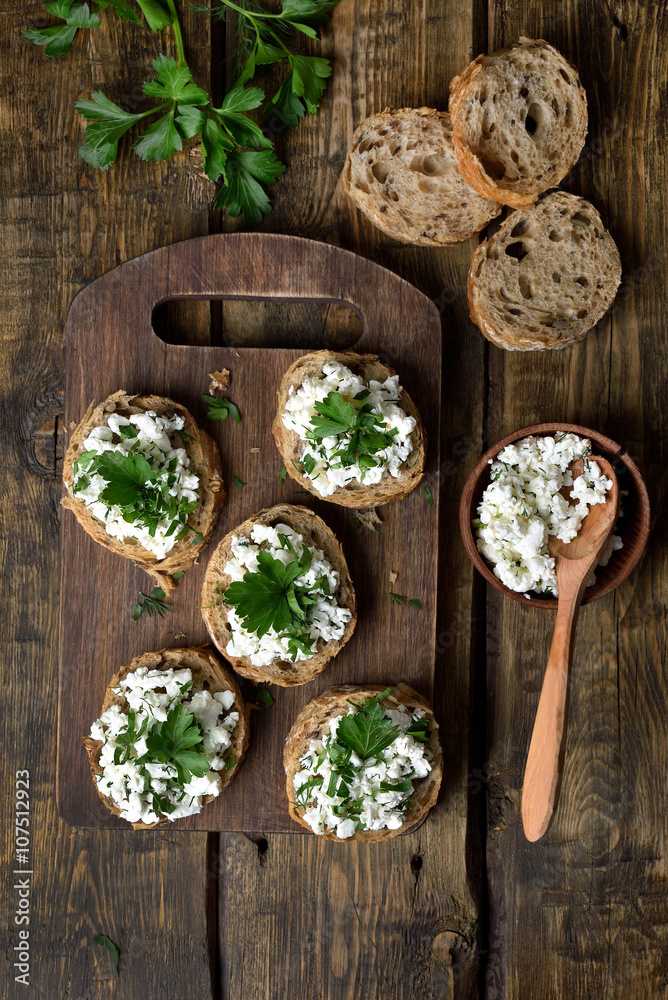 Curd cheese on bread, top view Curd cheese on bread, top view