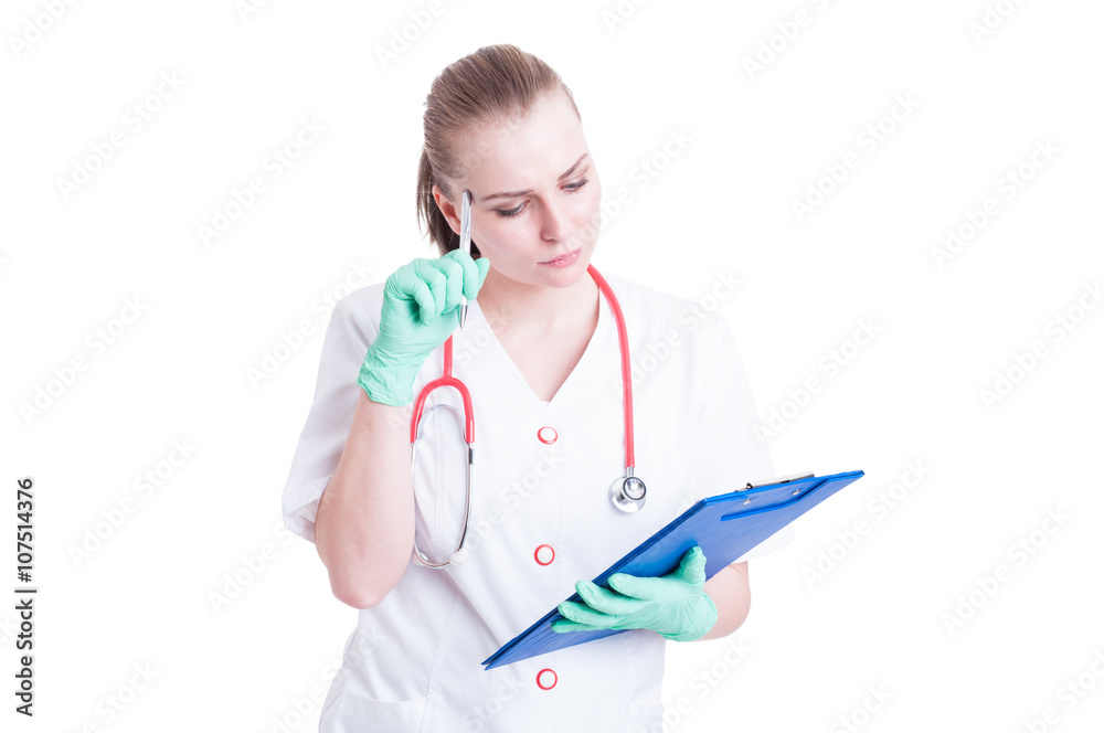 Beautiful pensive woman doctor ponder to a solution Beautiful pensive woman doctor ponder to a solution