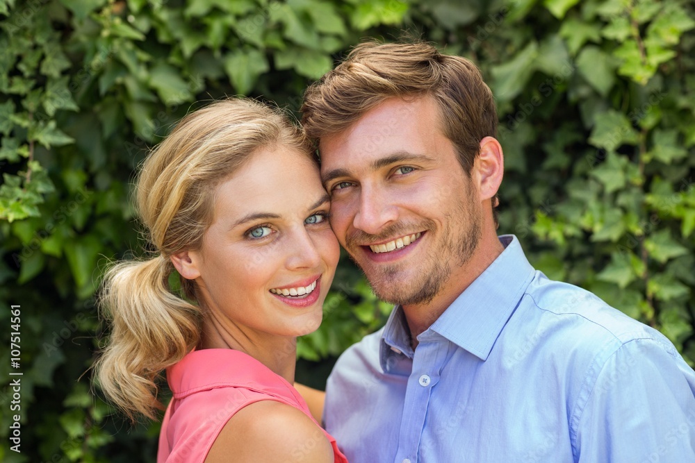 Happy romantic couple at front yard Happy romantic couple at front yard