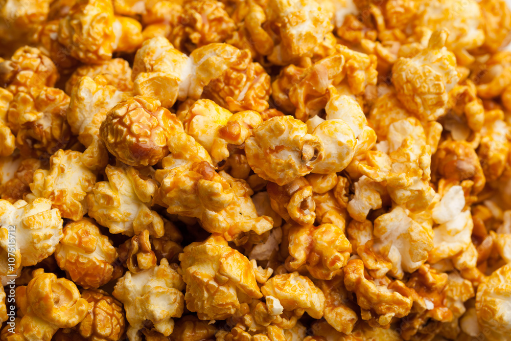 caramel pop corn background, closeup view