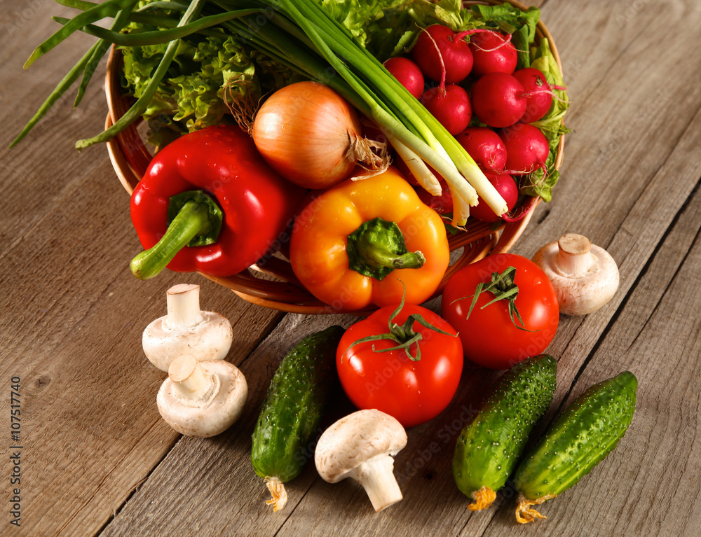 Vegetables . Fresh Bio Vegetable in a Basket. Over Nature Background Vegetables . Fresh Bio Vegetable in a Basket. Over Nature Background