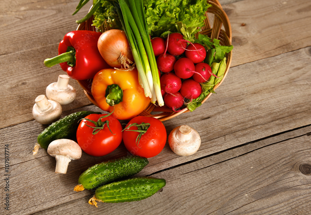 Vegetables . Fresh Bio Vegetable in a Basket. Over Nature Background Vegetables . Fresh Bio Vegetable in a Basket. Over Nature Background