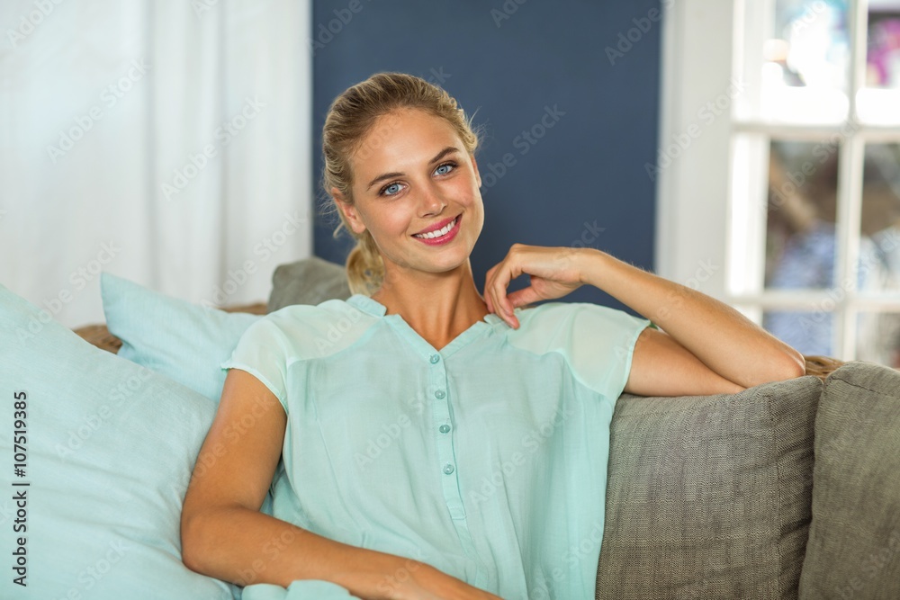 Portrait of beautiful woman on sofa Portrait of beautiful woman on sofa