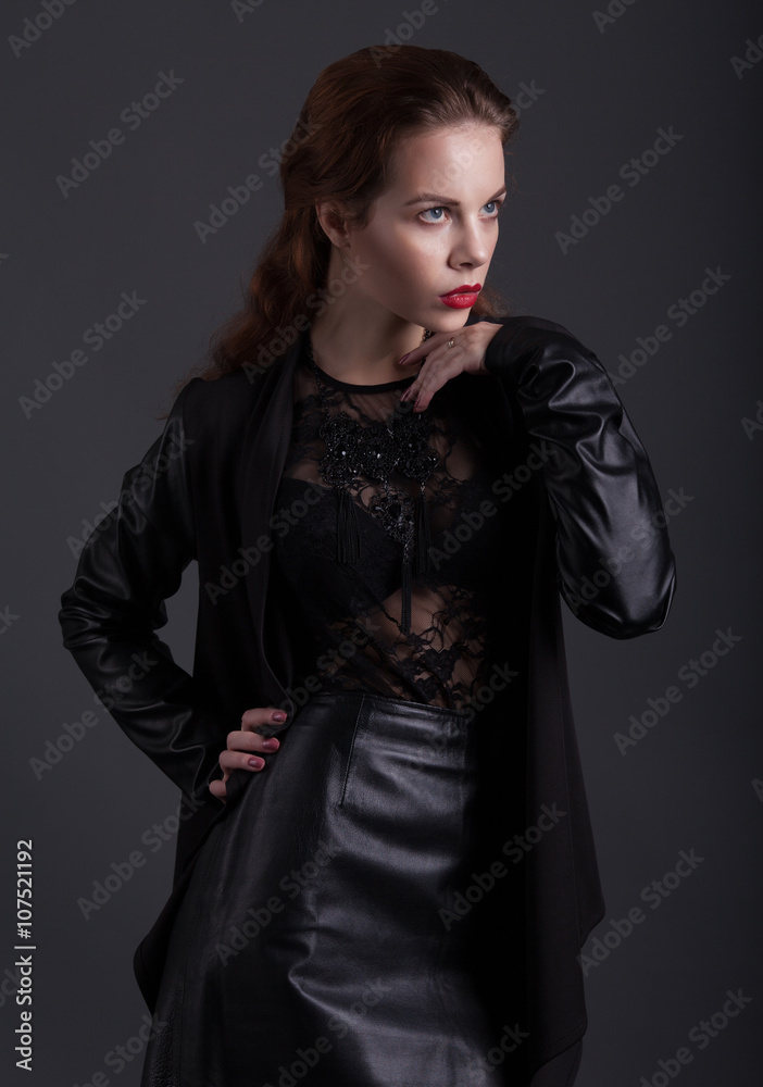 fashion model model holding little purse on gray background fashion model model holding little purse on gray background