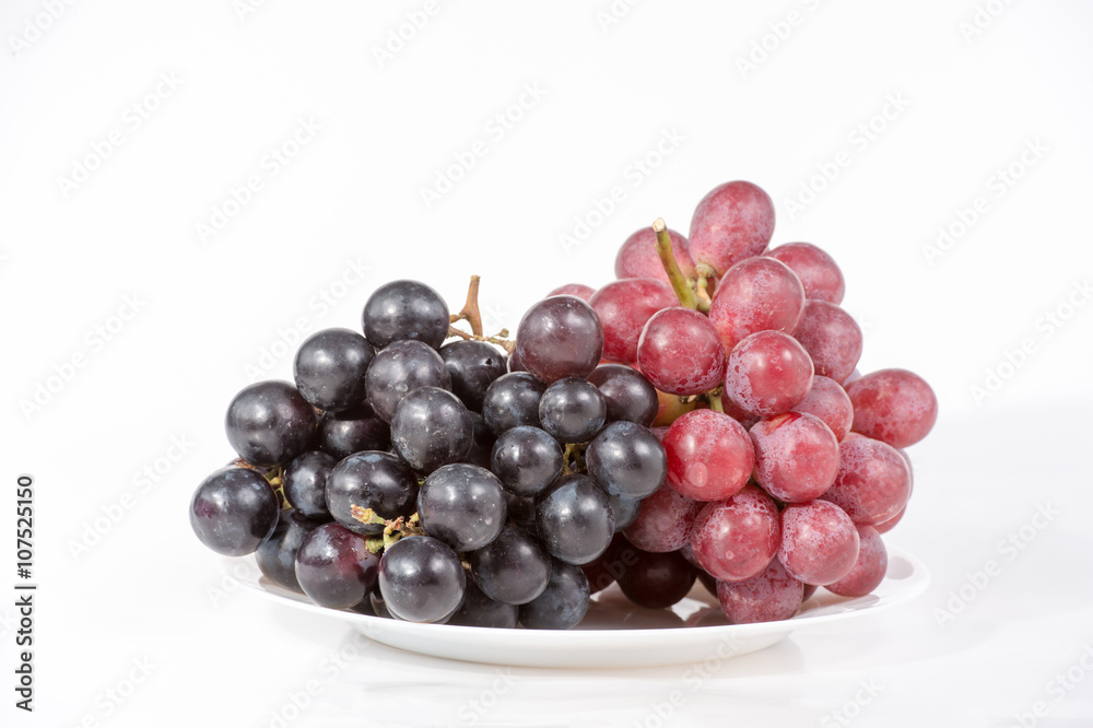 grape on white plate isolated on white background grape on white plate isolated on white background