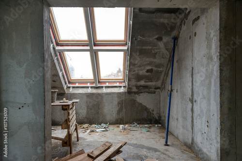 Rebuilding apartments. The room during renovation. Concrete interior. Development. © Magryt
