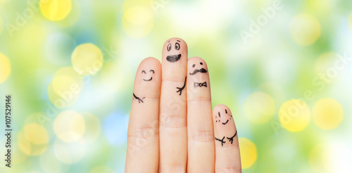 close up of hands and fingers with smiley faces
