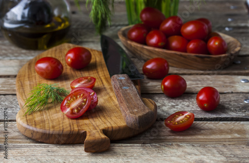 fresh, juicy and delicious tomatoes on a chopping board