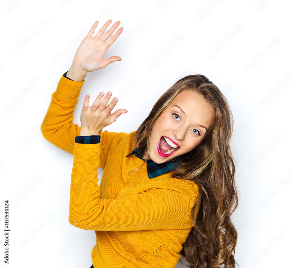 happy young woman or teen girl applauding happy young woman or teen girl applauding