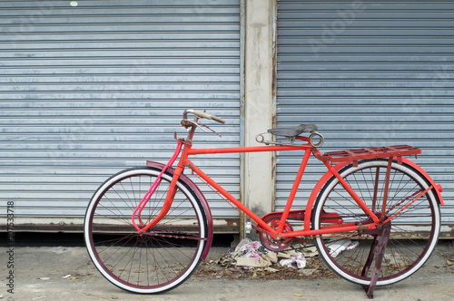 colorful classic bicycle with grunge background.