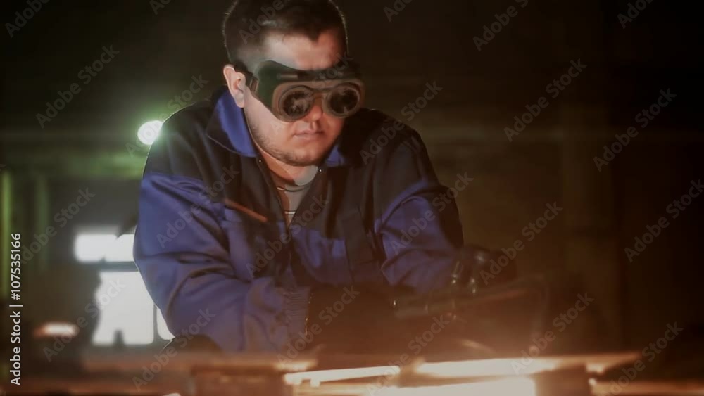 worker cuts metal with gas worker cuts metal with gas