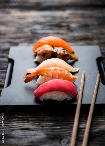 sashimi sushi set with chopsticks and soy