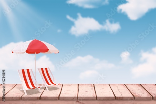 Fotografia, Obraz Composite image of image of sun lounger and sunshade
