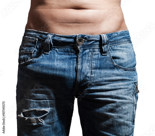 Fotografie relief a erection in blue jeans