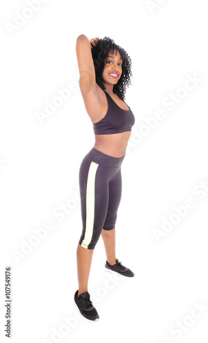 African American woman in exercising outfit.
