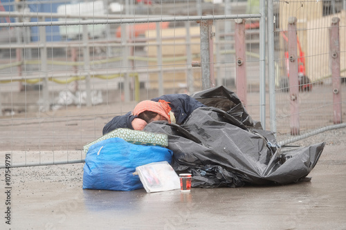 Stockholm, Sweden - April, 6, 2016: homeless woman in Stockholm, Sweden photo