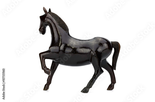 Beautiful sculpture of horse made of  wood isolated on the white