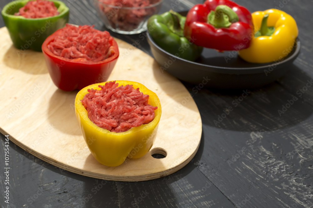 peppers stuffed with minced meat on old table peppers stuffed with minced meat on old table