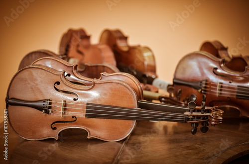 Close up shot of  violins photo