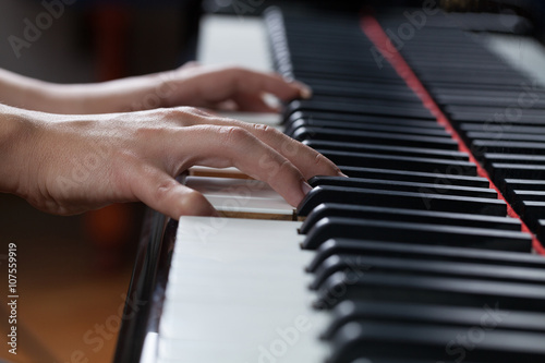A woman playing piano