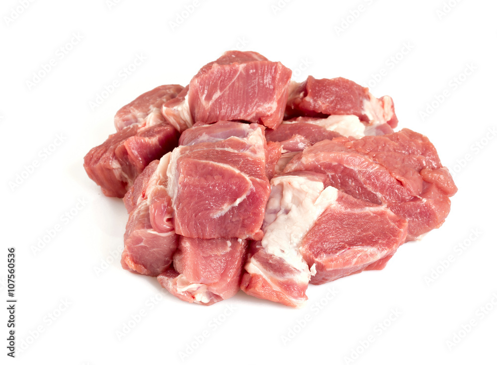 raw pork neck meat cut in pieces isolated on white raw pork neck meat cut in pieces isolated on white